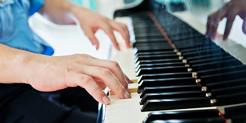 person playing a piano